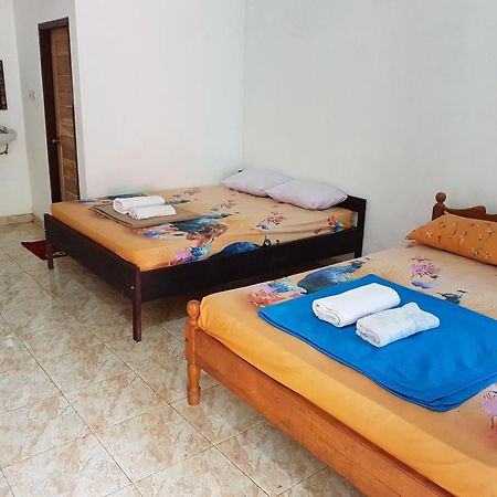 Red Island Bungalows Pasanggaran Habitación foto